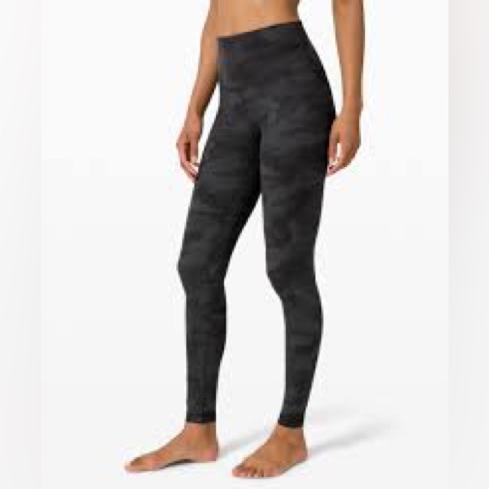 Lululemon size 4 align black camo pants. Excellent condition. No interior tag.